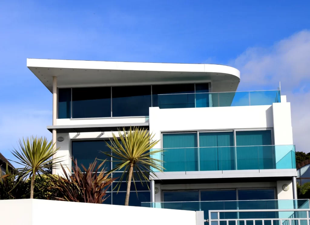 A white house on a blue sky.