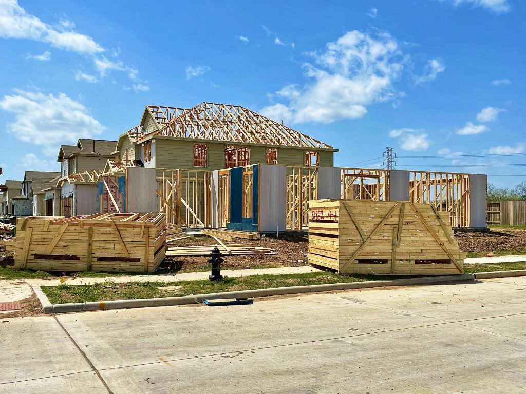 A house under construction with wood framing.