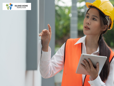 A professional inspector in a reflective vest and hard hat using a tablet for an assessment.